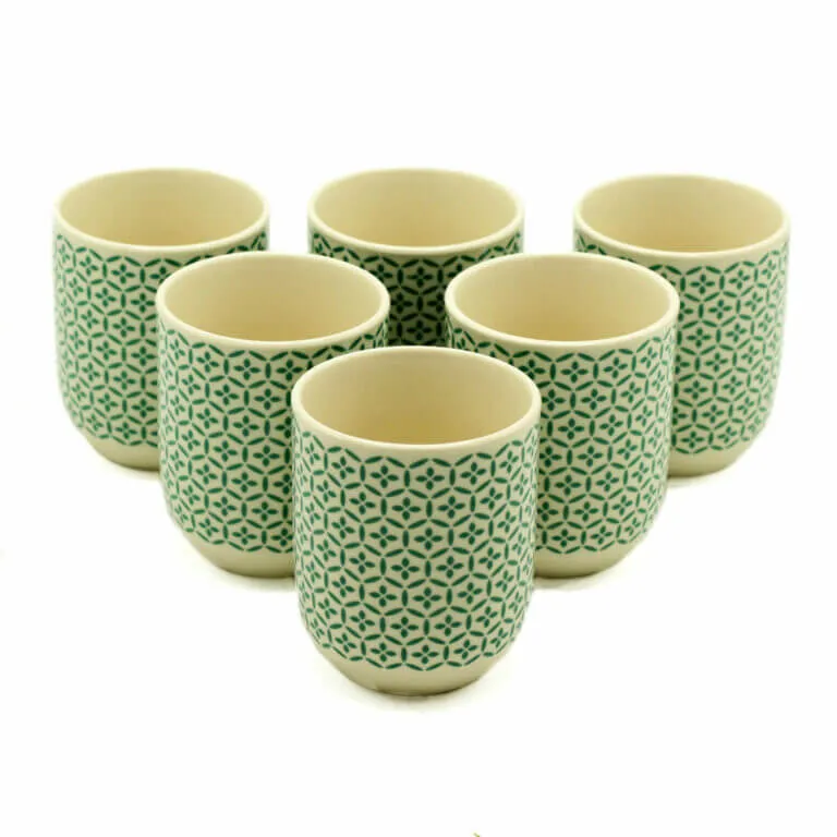 Six ceramic cups with a green geometric pattern are arranged in two rows on a white background.