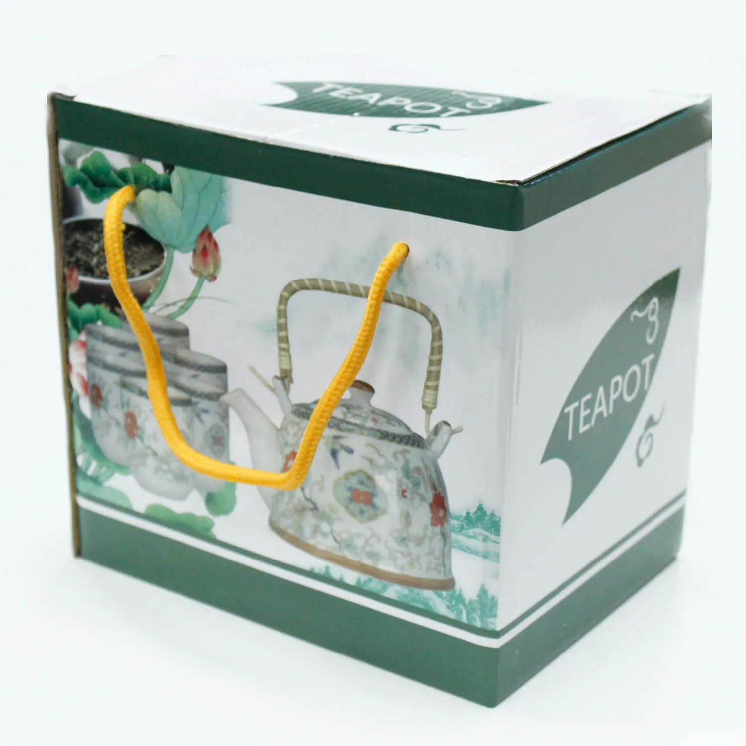 A cardboard box with a teapot illustration, green accents, the word